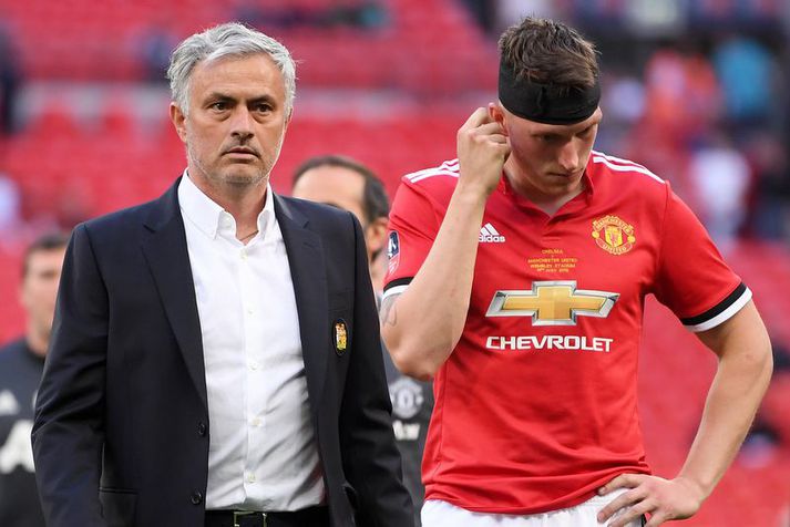 Phil Jones og Jose Mourinho.