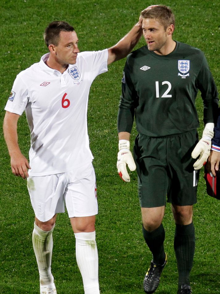 John Terry hughreystir Robert Green á HM í Suður-Afríku.