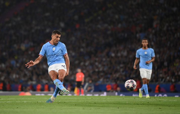 Rodri við það að skora markið sem tryggði Man City sigur í Meistaradeild Evrópu.