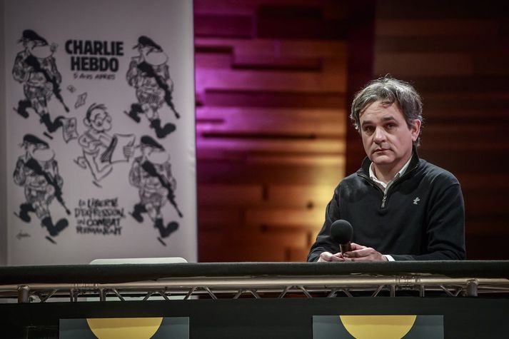 Laurent Sourisseau, skopmyndateiknari og ritstjóri Charlie Hebdo, á ráðstefnu í janúar. Sú ráðstefna var um málsfrelsi og var haldin í tilefni af því að fimm ár voru liðin frá árásinni á skrifstofu tímaritsins.